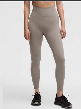 Lululemon Glow Up Super-High-Rise Tight 25"
Warm Ash Grey size 6 NWT